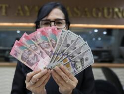 Idr Tembus 18.009 per Usd AS, Pasar Respons Negatif Mundurnya Bos Banksentral